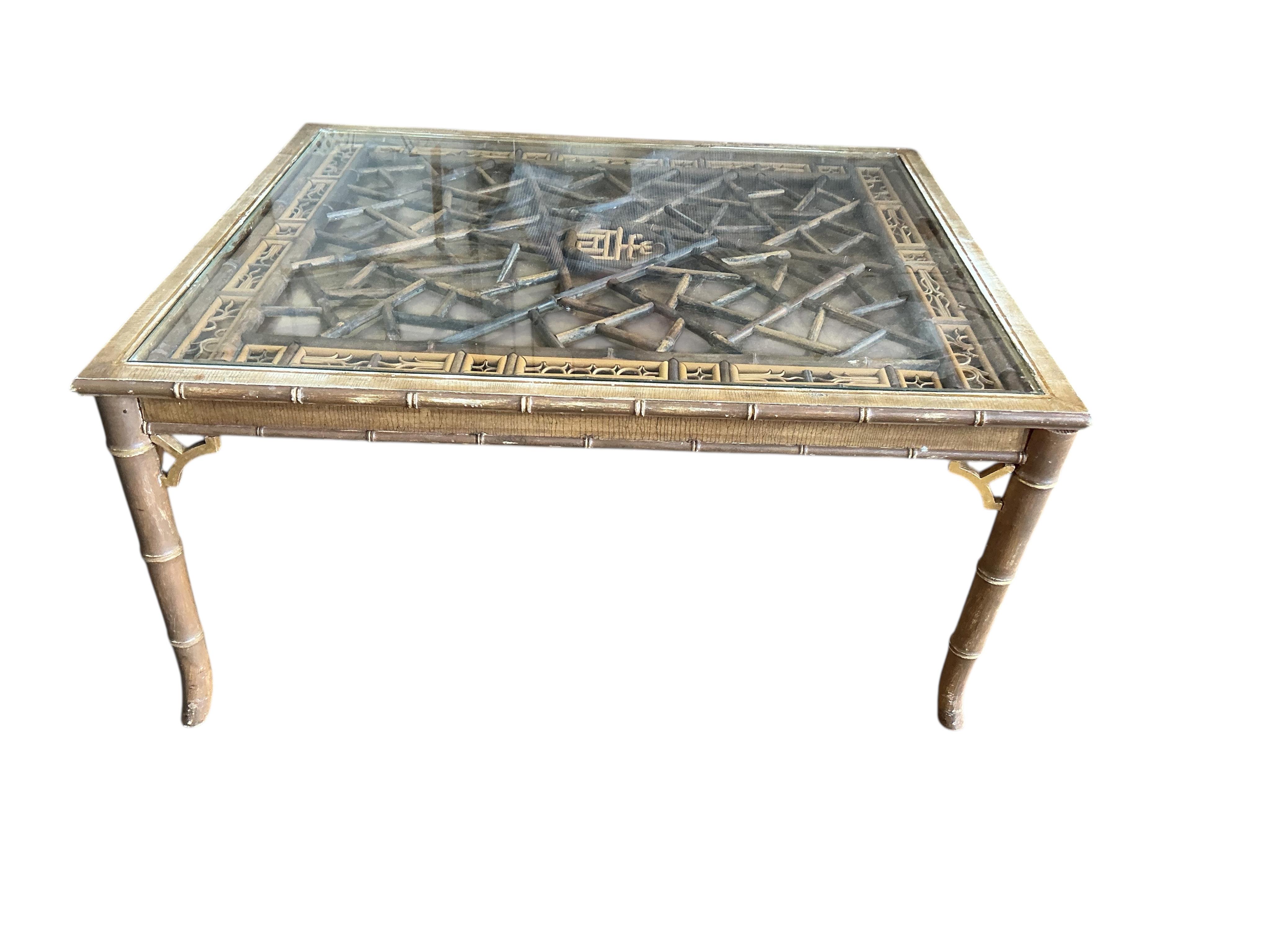 A Chinese rectangular giltwood bamboo coffee table on simulated bamboo underframe, width 91cm, depth 77cm, height 44cm
